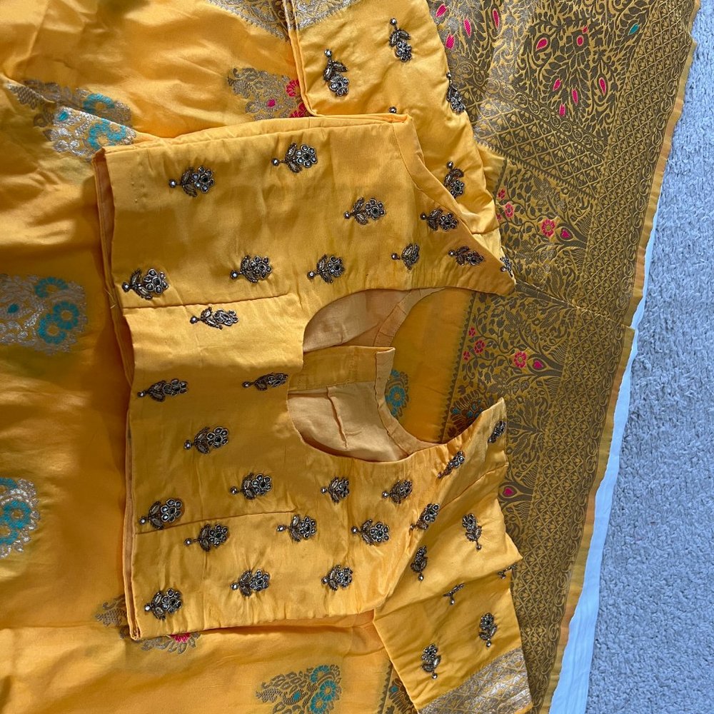 Indian traditional orange silk saree with handwork blouse